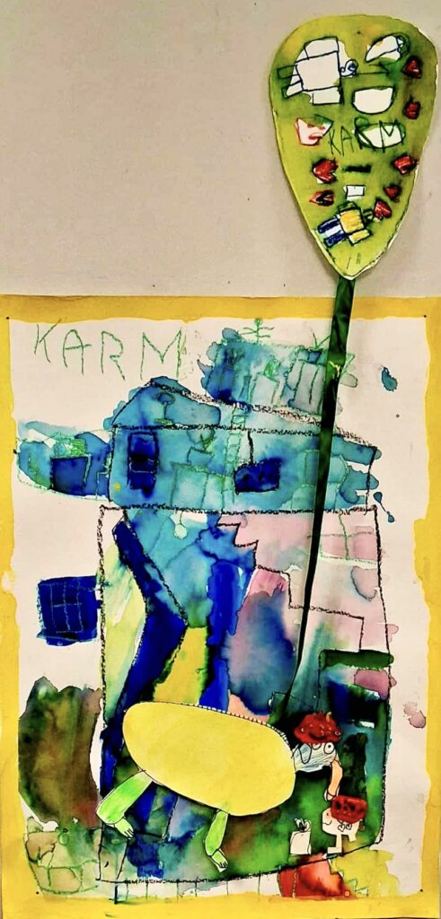 Lapse joonistus, mis kujutab kollast elevanto rohelise õhupalliga